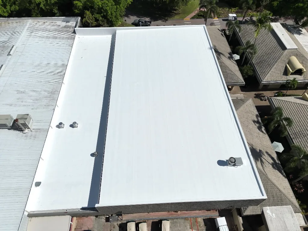 Roofing crew performing repairs on Florida home